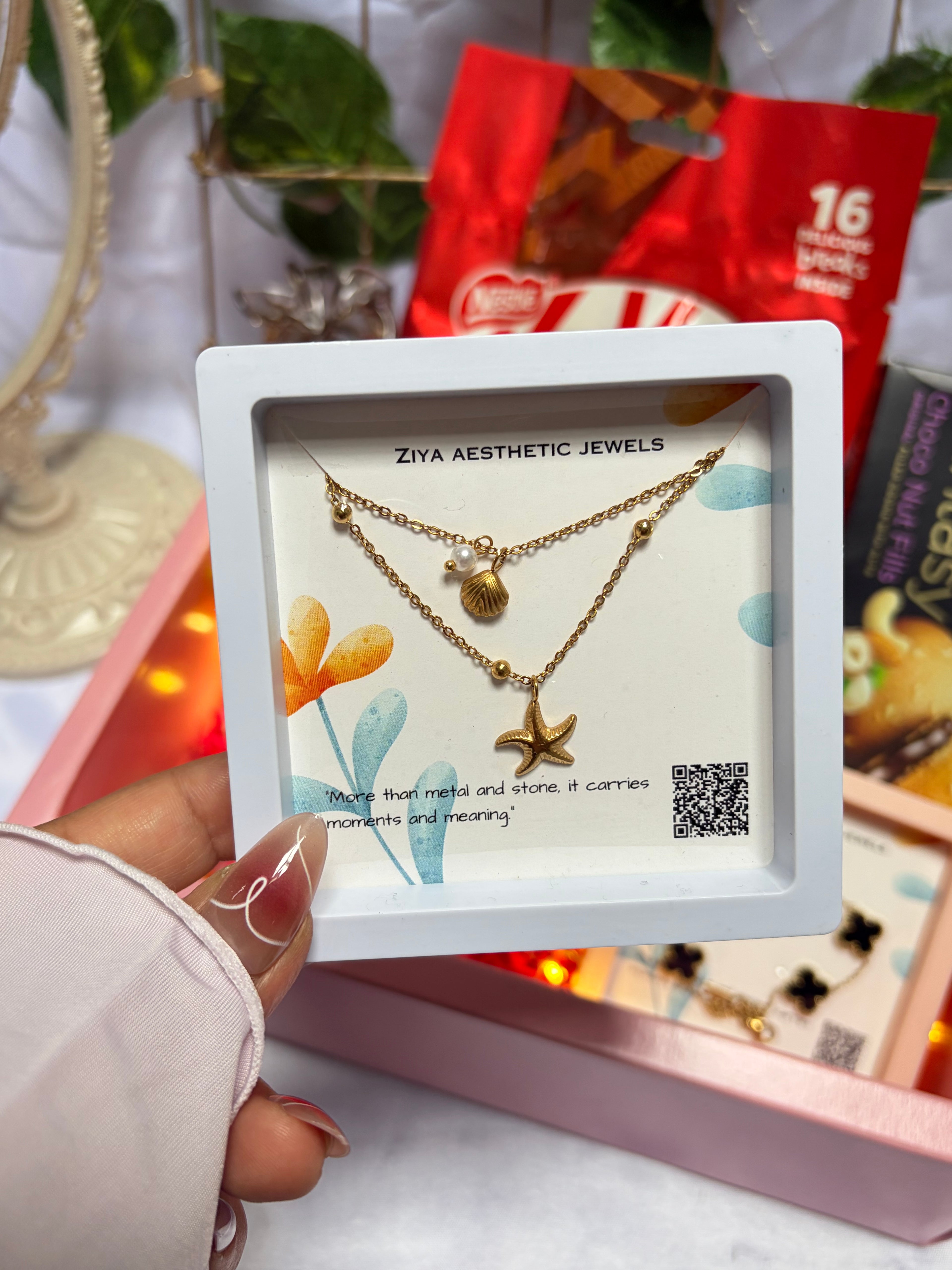 Layered star shells necklace